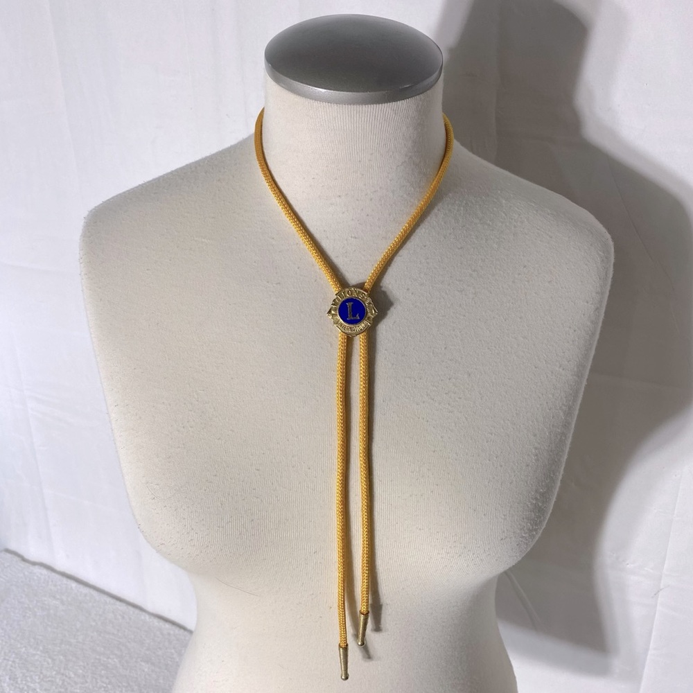 Vintage Handmade Yellow Gold Tone Purple Lions Club Bolo Tie W Metal Tips